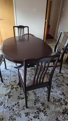 Dark wood oval extending